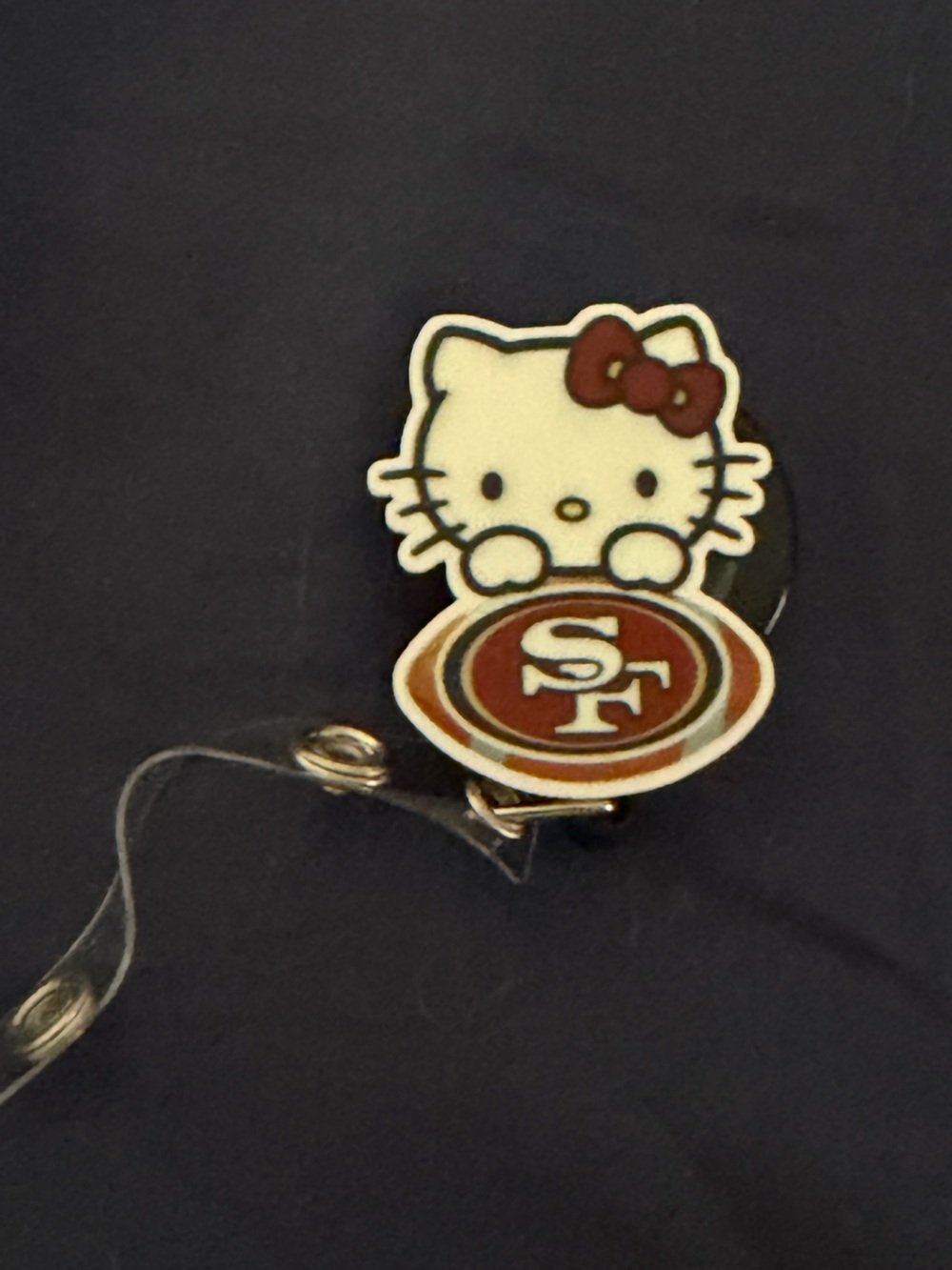 Hello Kitty SF Logo Retractable Badge Reel โ Red Accent